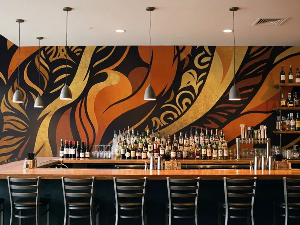 Bar with custom wall wrap mural installed